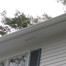 How Does Gutter Cleaning Help Prevent Exterior Water Damage?